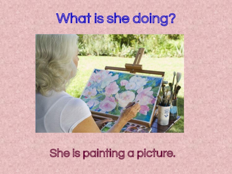 She is painting. She is Painting a picture. What is she doing. What is Painting?. What is she doing picture.